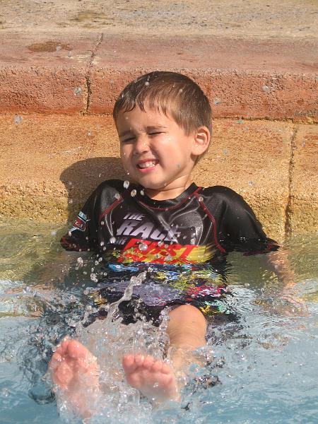 IMG_0246.JPG - Reese splashing around in the kiddie pool.